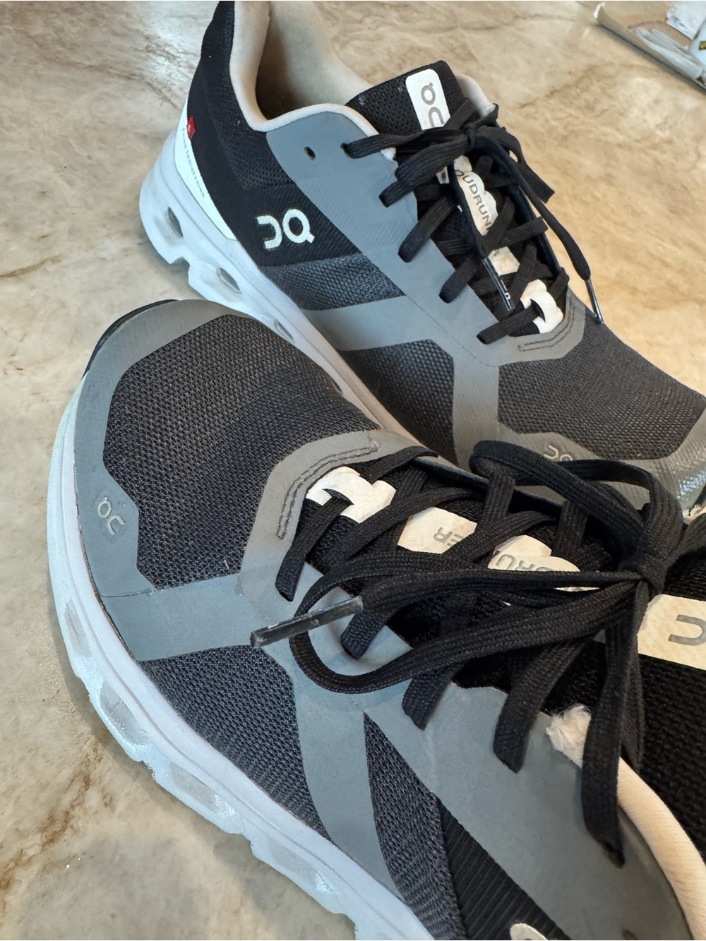 On Running women’s Athletic Shoes in Black and Gray